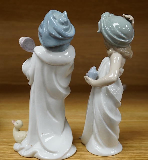 Two Lladro figures of children, 19cm high. Condition - good